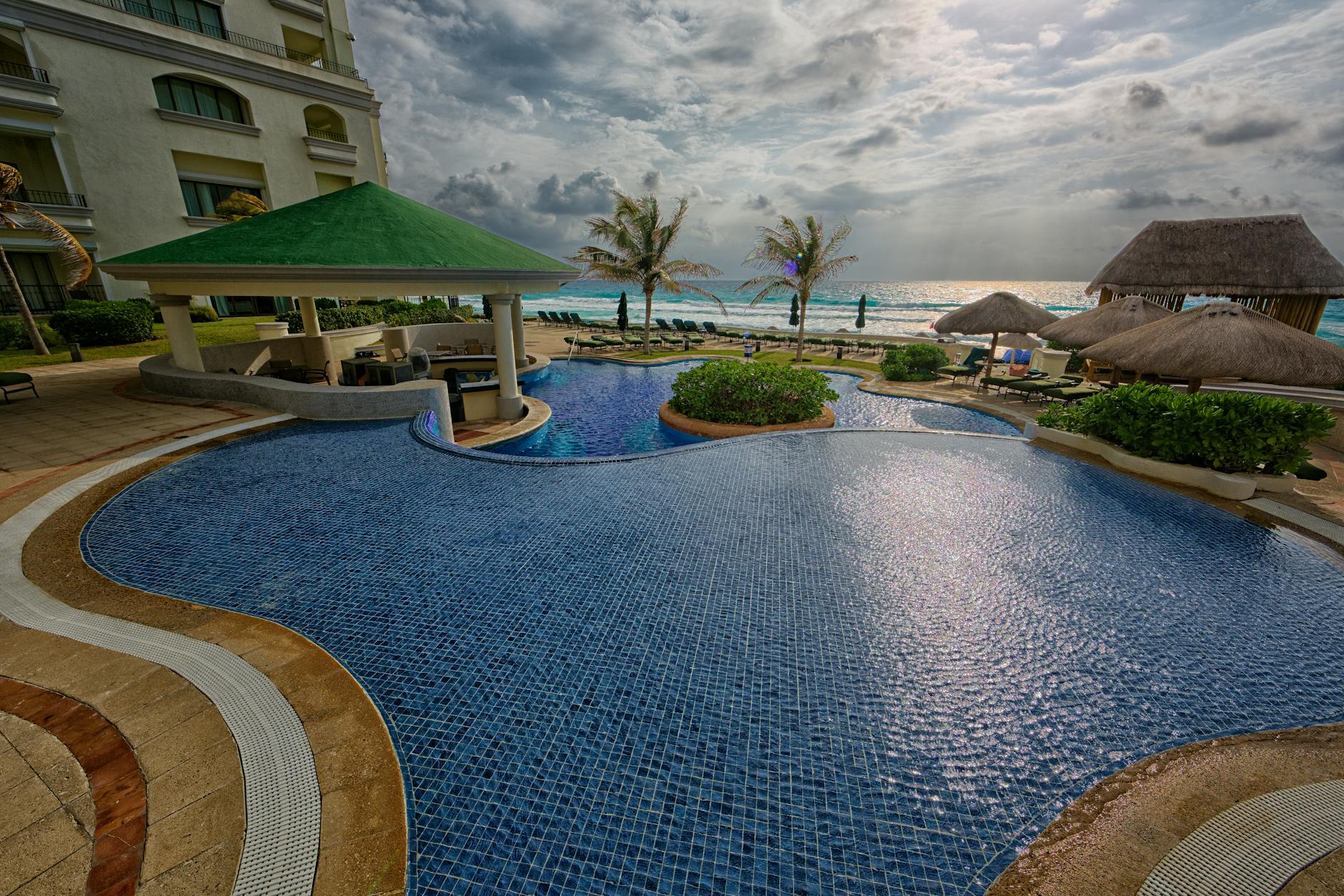 Hotel Xcaret vs Riu Palace Riviera Maya: Worth the Premium?